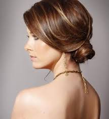 5 Sensational Hairdos for the workplace-Low Twisted Chignon Side Swept